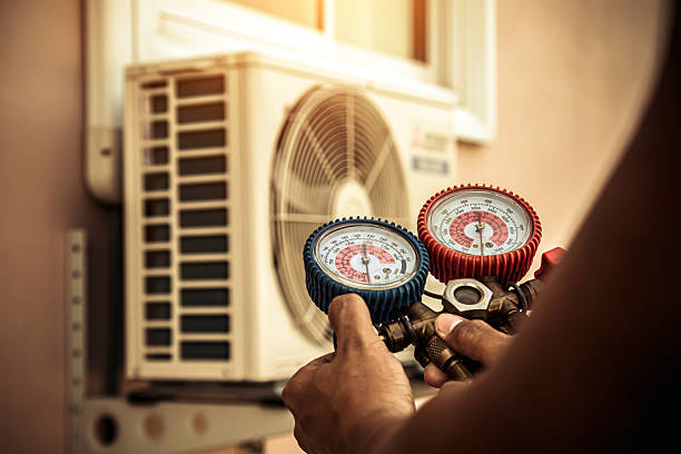 Professional Hvac technician working in Pepperell, MA